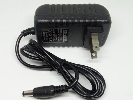 CARGADOR PARA CAMARA DE SEGURIDA 12V A 1AMP.